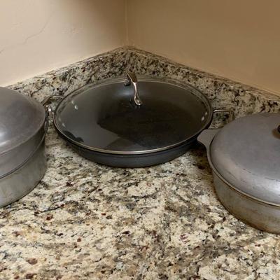 Cast Aluminum Dutch Ovens And Calphalon Pan With Lid