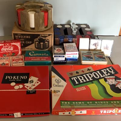 Assortment Of Playing Cards, Poker Chips and Games