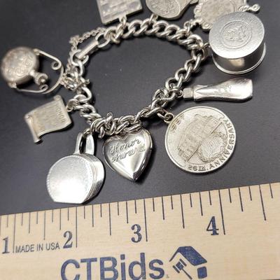 1950/1960 Sterling Silver 6" Charm Bracelet With 9 Charms