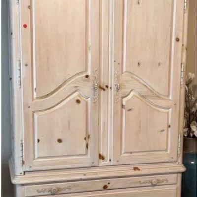 Three shelf Armoire with three drawers and a jewelry drawer manufactured by National Mt. Airy.