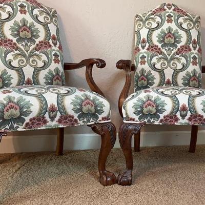 Pair upholstery Arm Chairs carved wood and claw feet with floral design 