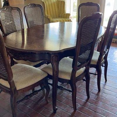 Wood dining  table by Thomasville Furniture, table has two leafs.