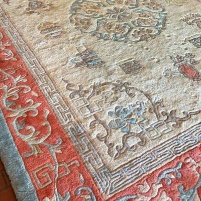 Large Area rug possibly Turkish hand woven in tan,peach, baby blue floral design with fringes