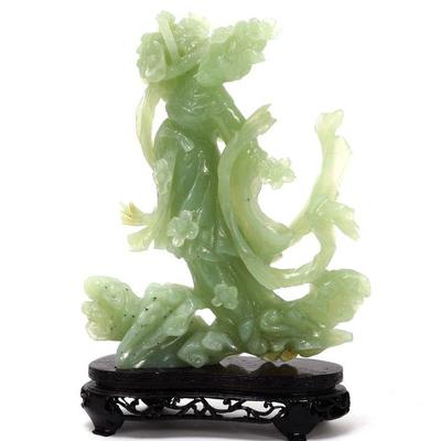 Lot 270 flower adorned guanyin serpentine statue wstand