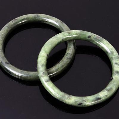 Lot 191 pair of chinese mottled jade bangles