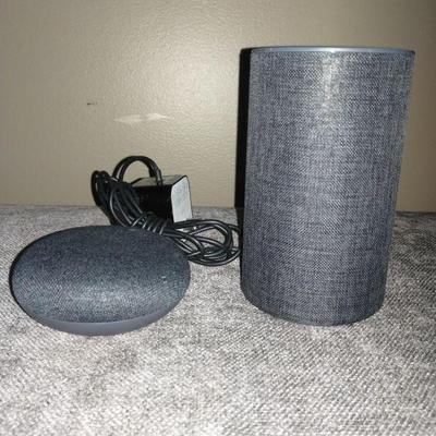 Amazon Echo Gen 2 smart speaker and Dot .