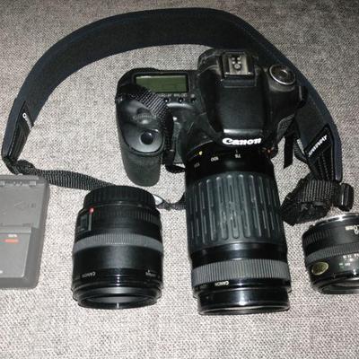 Canon EOS 50D with 3 lenses and battery charger.
