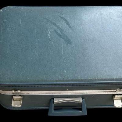 Timeless 1960s Hard-Shell Suitcase