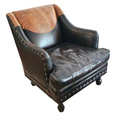 Leather and alligator chairs with nailhead trim and matching ottoman.  One of a pair. 