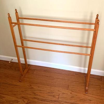 One of a pr. of quilt racks