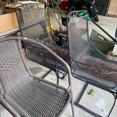 pair of vintage wrought iron springer chairs