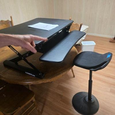Standing office desk and swivel stool