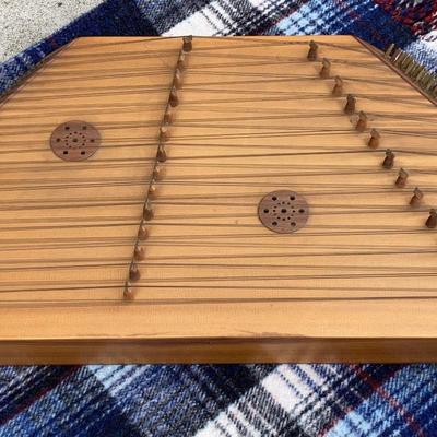 Trapezoidal Stringed Intrument