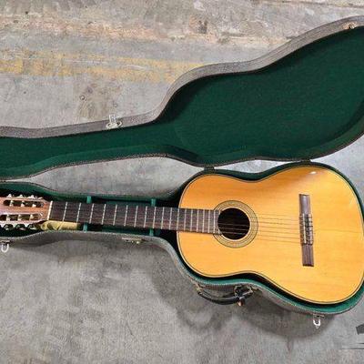 #9010 • Acoustic Guitar with Case
