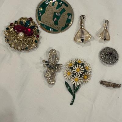 Very Vintage Brooches including Metal Daisies, Crystals and Mother of Pearl