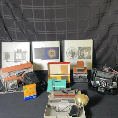 Sx-70 Polaroid & Auto 104 Land Cameras, Polaroid EE100 Special, Canon Power shot A520, Sekonic, Book