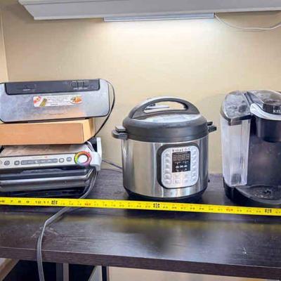 (4) Kitchen Appliances
Instant Pot, Keurig, Cuisinart vaccuum Sealer, Optigrill