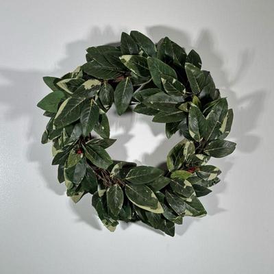 Faux Grapevine Wreath | Grapevine wreath decorated with plastic leaves and berries. Dimensions: d. 3 x dia. 18 in