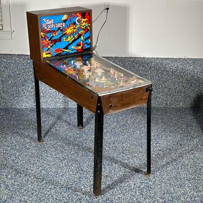 Vintage “Star Explorer” Upright Pinball Machine | A mid-century style stand-up pinball machine featuring a vibrant space-opera theme...