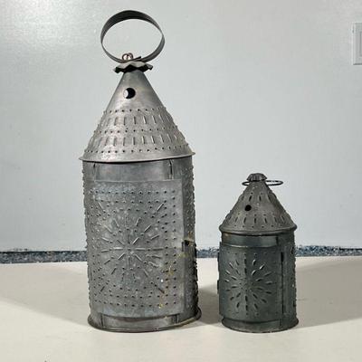 (2pc) PUNCHED TIN LANTERS | Folk art punched tin lanterns. - h. 16 x dia. 6 in (larger)
