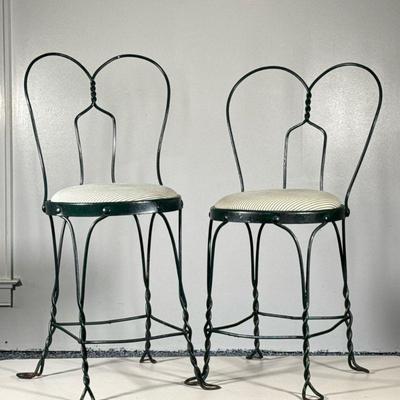 (2pc) Pair Antique Ice Cream Parlor Chairs | Pair of antique wire metal ice cream parlor chairs painted green with striped upholstered...