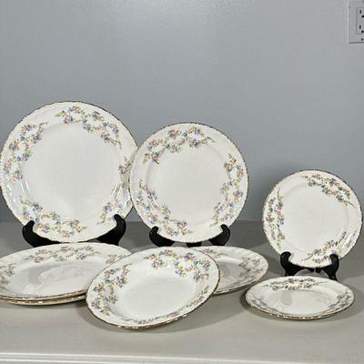 (8pc) POPE-GOSSER FLORAL PORCELAIN DISHES | Including: 3 dinner plates, 2 salad, 1 bowl and 2 bread. Delicate floral design with gold...
