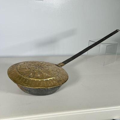 ANTIQUE BRASS BED WARMER | Antique punched brass bed warmer. Dimensions: h. 3 x w. 35 in