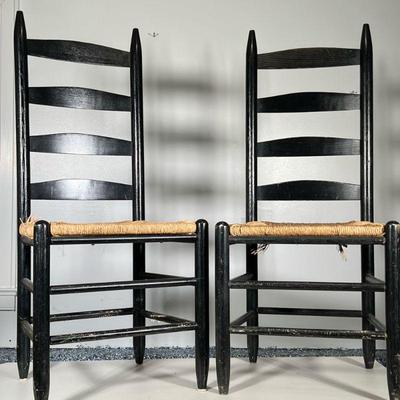 (2pc) PAIR RUSH LADDER BACK CHAIRS | Farmhouse ladder back chair with rushed seat, painted black. - h. 42 x w. 18 x d. 15.5 in
