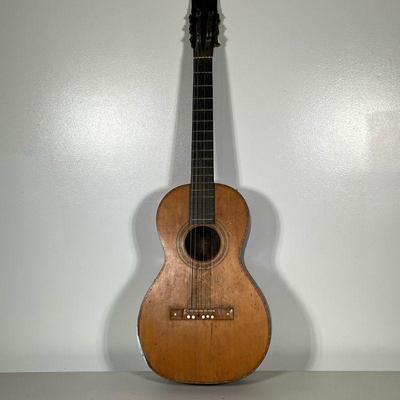 6-String Acoustic Guitar | Older 6-string acoustic guitar.