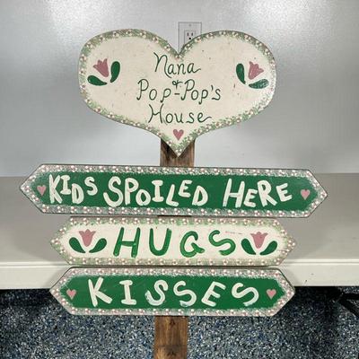 Grandparents Yard Sign | “Nana and Pop-Pop’s House” painted on whimsical sign with arrows towards hugs and kisses. Painted in the colors...