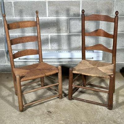 (2pc) SMALL LADDER BACK CHAIRS | 2 small ladder back chairs with curved back and rush seat. Dimensions: h. 36 x w. 28 x d. 15 in
