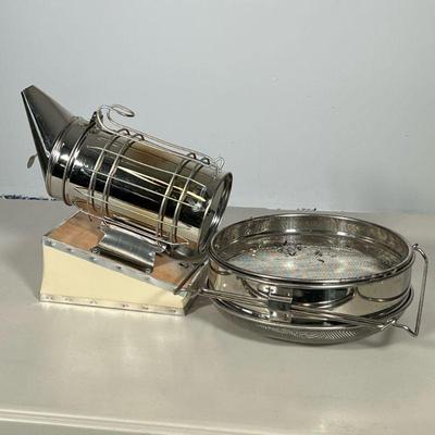 (3pc) Bee Keeping Equipment | Including: Bee hive smoker, bee suit size xxl and honey strainer. Dimensions: h. 10 x w. 5 x l. 11 in...