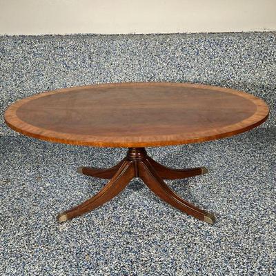 ETHAN ALLEN NEWPORT PEDESTAL LOWTABLE | Oval pedestal Ethan Allen Newport banded coffee table with wood inlay over spindle carved...