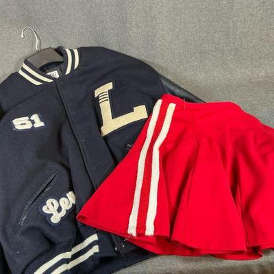 vintage varsity jacket and cheerleader skirt