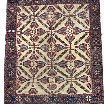 ANTIQUE HAND KNOTTED KUBA RUG