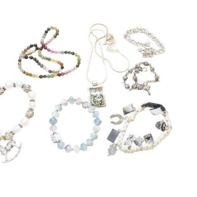 9 PIECES OF VINTAGE SILVER TONE COSTUME JEWELRY