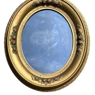 VICTORIAN-ERA GILT WOOD FRAMED OVAL MIRROR WITH POLYCHROME FLORAL DETAIL