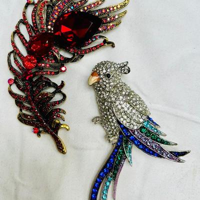 Kirks Folly Feather and Parrot Brooches