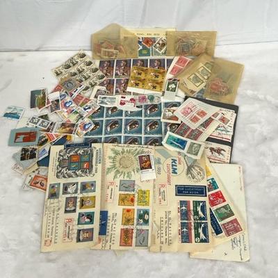 Collection Of Foreign Stamps In Tin Container 
