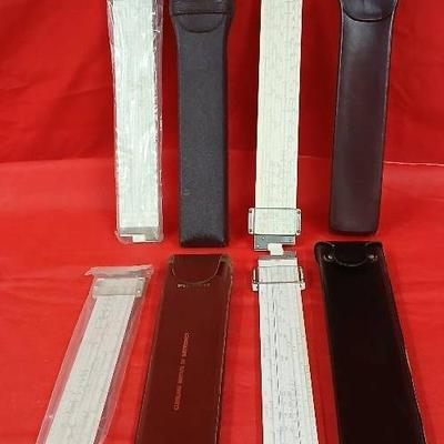 Four Vintage Slide Rules