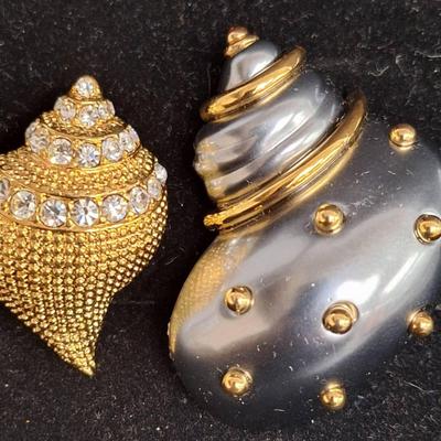 Kenneth Jay Lane's Steel Gray Sea Shell Brooch And Gold Tone Sea Shell Brooch