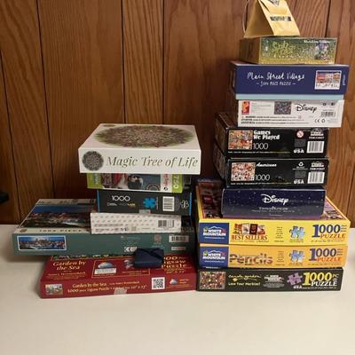 The Real Puzzle Is… 15 Boxes Of Puzzles + 4 Pieces