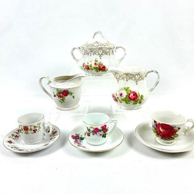 Assorted Porcelain Tea Cups with Saucers, 2 Cream Pitchers and 1 Sugar Bowl