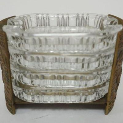 1148	NEST OF OVAL GLASS ASHTRAYS IN ORNATE BRONZE HOLDER, MARKED ITALY ON BASE, APPROXIMATELY 4 1/2 IN X 2 1/2 IN X 3 1/2 IN H
