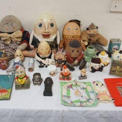 1178A	LARGE GROUP OF ASSORTED HUMPTY DUMPTY ITEMS INCLUDING DOLLS, COVERED JARS, METAL FIGURES, BOOKS, PUZZLES, CAST IRON BANK
