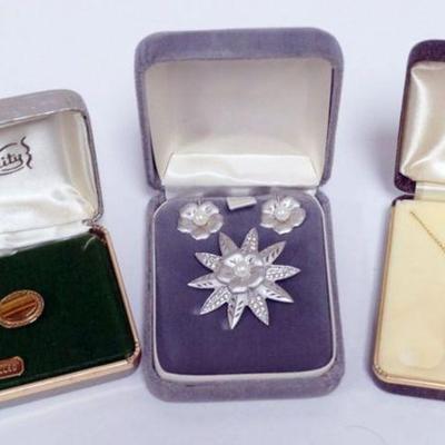 1096	ASSORTED LADIES JEWELRY INCLUDING 2 12K GOLD FILLED NECKLACES 1 WITHOUT CHAIN, STERLING SILVER PIN AND EARRING SET
