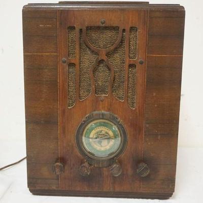 1256	ANTIQUE SILVERTONE TABLE TOP RADIO, APPROXIMATELY 13 IN X 9 IN X 17 IN HIGH
