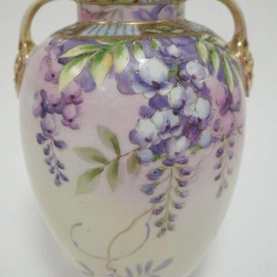 1063	HAND PAINTED NIPPON DOUBLE HANDLED VASE, APPROXIMATELY 9 IN HIGH
