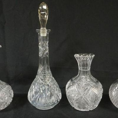 1135	ASSORTE CUT GLASS DECANTERS AND CARAFES, TALLEST APPROXIMATELY 16 N H
