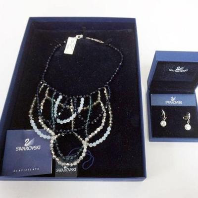 1093	SWARIVSKI CRYSTAL JEWELRY, MUTI COLORED DRAPE NECKLACE IN BOX AND CRYSTAL EARRINGS IN BOX
